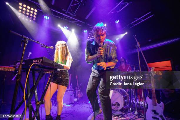 November 10: Sara Dobbs, Will Butler, and Miles Francis Arntzen of Will Butler + Sister Squares perform live on stage during a concert at Privatclub...