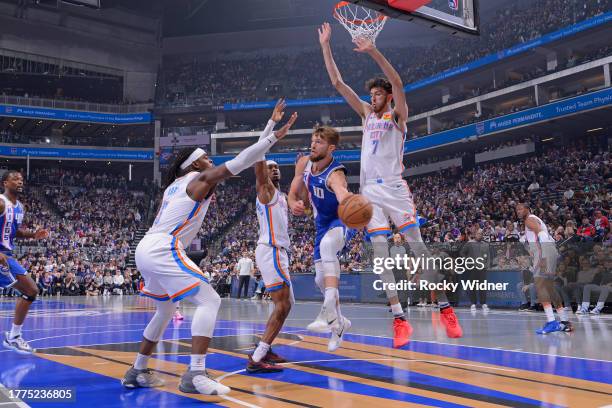 Domantas Sabonis of the Sacramento Kings looks to pass the ball during the game against the Oklahoma City Thunder during the In-Season Tournament on...