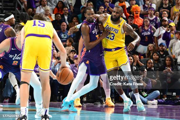 Kevin Durant of the Phoenix Suns and LeBron James of the Los Angeles Lakers battle for position during the In-Season Tournament on November 10, 2023...