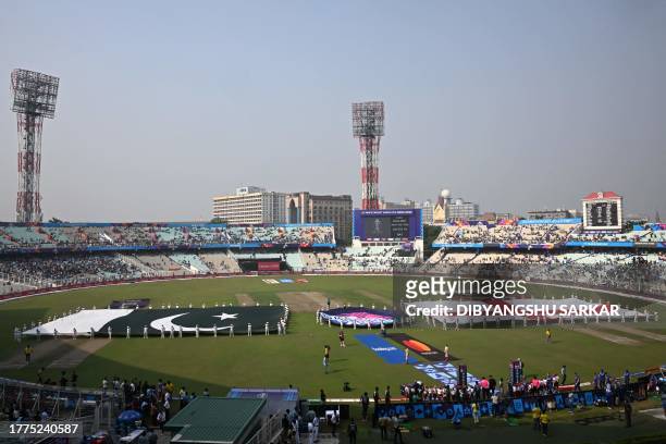 The national flags of Pakistan and England are displayed before the start of the 2023 ICC Men's Cricket World Cup one-day international match between...