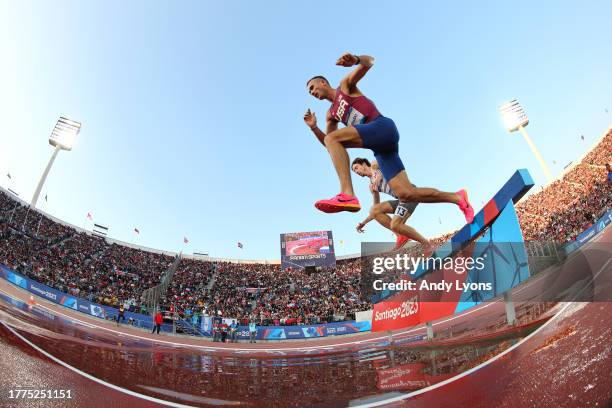 Jean-simon Desgagnes of Team Canada and Daniel Michalski of Team United States compete in Men's 3000m Steeplechase Final at Estadio Nacional de Chile...