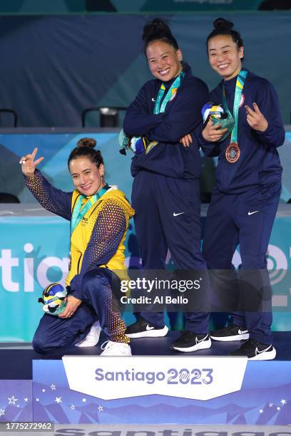 Silver medalist Luma of Team Colombia, Gold medalist Sunny of Team United States and Bronze medalist La Vix of Team United States pose on the podium...