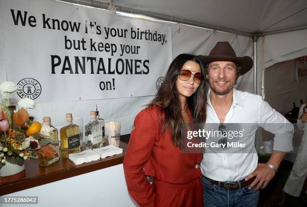Camila McConaughey and Matthew McConaughey attend a tailgate party to celebrate the launch of their new Pantalones Tequila and Matthew's 54th...