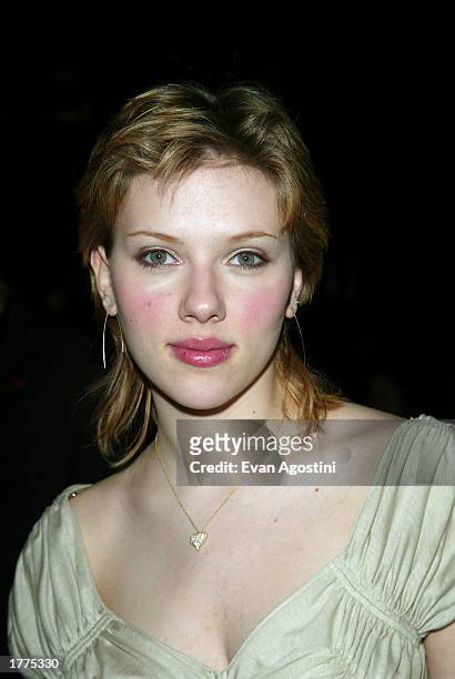 Actress Scarlett Johansson attends the BCBG Max Azria Fall/Winter 2003 Collection fashion show at the Theater in Bryant Park during Mercedes-Benz...