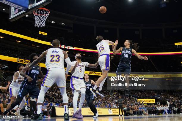 Cole Anthony of the Orlando Magic shoots the ball over Austin Reaves of the Los Angeles Lakers during the second half at Amway Center on November 04,...