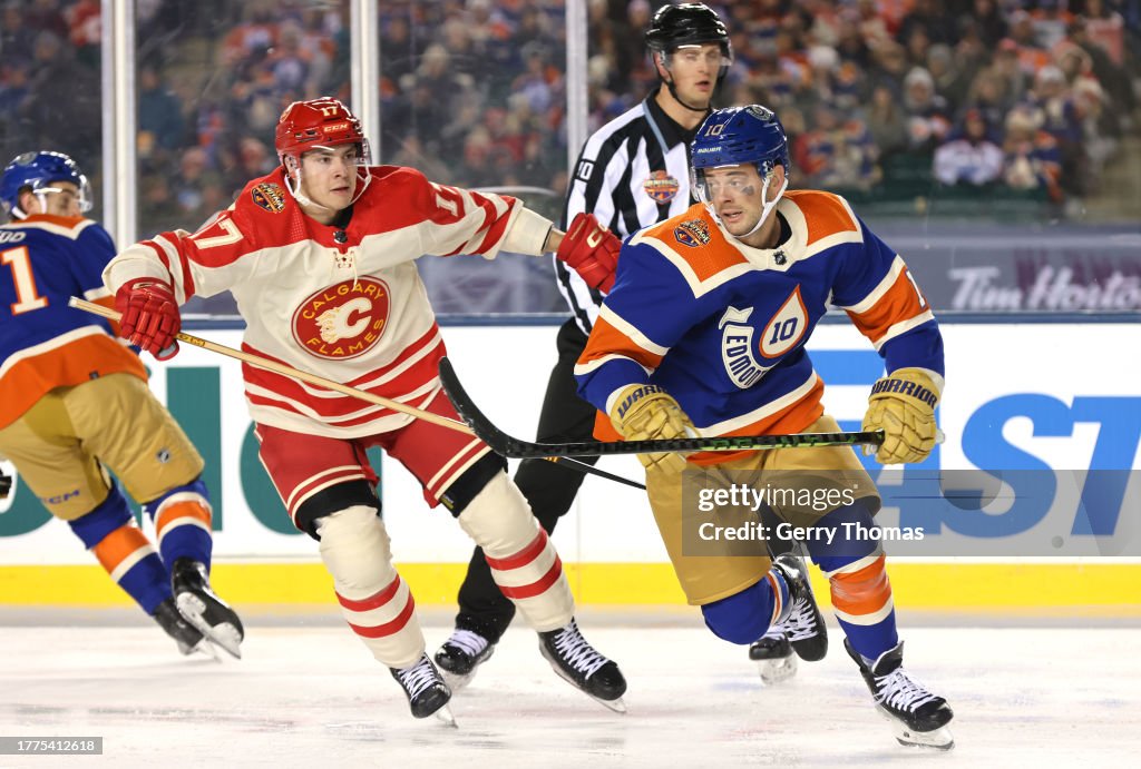 Edmonton Tim Yegor Sharangovich of the Calgary Flames and Derek Ryan of the... News ...