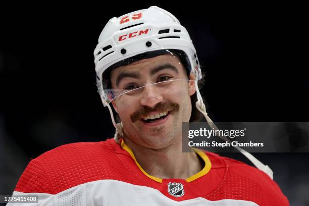 Dillon Dube of the Calgary Flames warms up before the game against the Seattle Kraken at Climate Pledge Arena on November 04, 2023 in Seattle,...