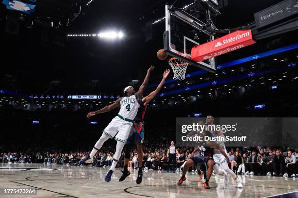 Jrue Holiday of the Boston Celtics attempts a layup during the fourth quarter against the Brooklyn Nets at Barclays Center on November 04, 2023 in...