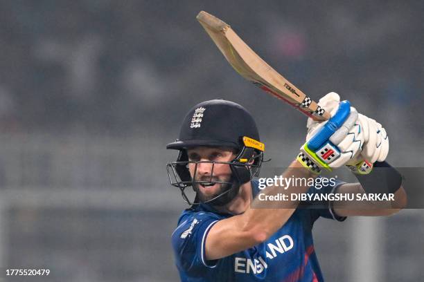 England's Chris Woakes plays a shot during the 2023 ICC Men's Cricket World Cup one-day international match between England and Pakistan at the Eden...