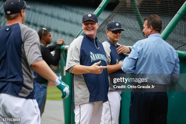 Manager Eric Wedge of the Seattle Mariners smiles during batting practice prior to the game against the Los Angeles Angels of Anaheim at Safeco Field...