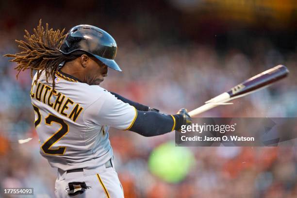 Andrew McCutchen of the Pittsburgh Pirates breaks his bat on a single against the San Francisco Giants during the first inning at AT&T Park on August...