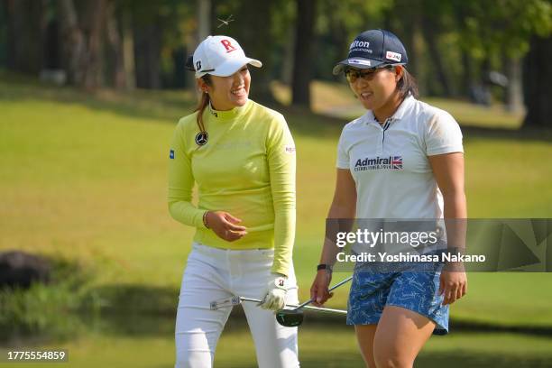 Mone Inami and Nasa Hataoka of Japan share a laugh on the 6th hole during the final round of the TOTO Japan Classic at the Taiheiyo Club's Minori...