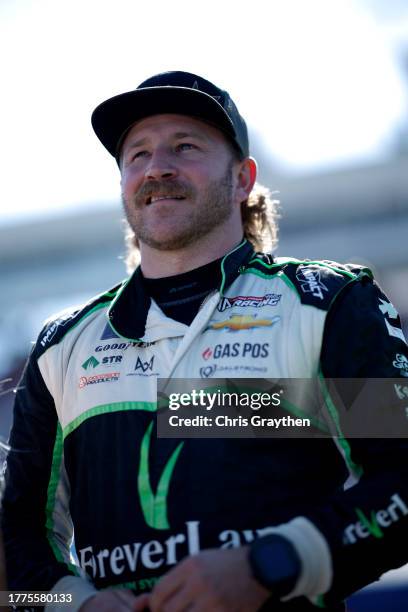 Jeffrey Earnhardt, driver of the ForeverLawn Chevrolet, looks on during qualifying for the NASCAR Cup Series Championship at Phoenix Raceway on...