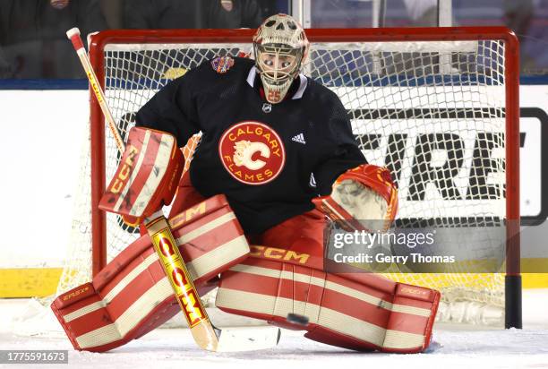 Goaltender Jacob Markstrom of the Calgary Flames defends his net during practice at Commonwealth Stadium on October 28, 2023 in Edmonton, Alberta.