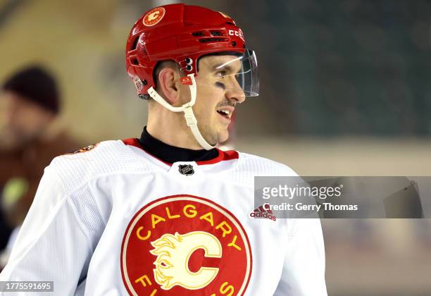 Mikael Backlund of the Calgary Flames looks on during practice at Commonwealth Stadium on October 28, 2023 in Edmonton, Alberta.