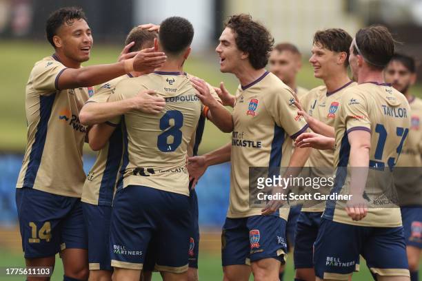 Apostolos Stamatelopoulos of the Jets celebrates his goal with team mates during the A-League Men round three match between Newcastle Jets and...