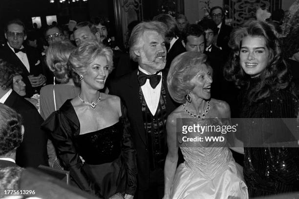 Marianne Gordon, Kenny Rogers, Barbara Davis, and Brooke Shields attend an event, benefitting the Children's Diabetes Foundation, at the Denver City...