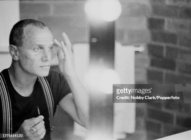 British Actor Steven Berkoff applying stage make-up in his dressing room for a dress rehearsal for the production of "Fall of the House of Usher &...