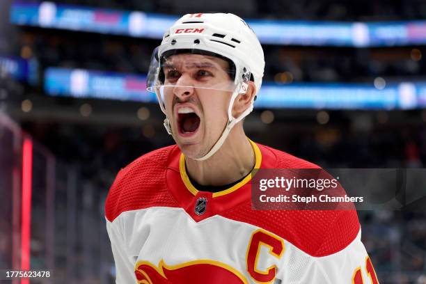 Mikael Backlund of the Calgary Flames celebrates his goal against the Seattle Kraken during the third period at Climate Pledge Arena on November 04,...