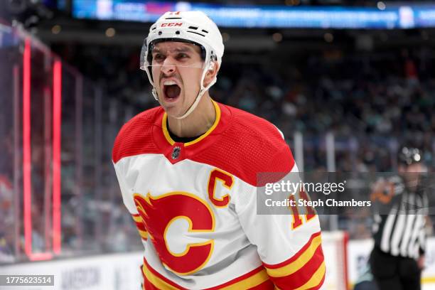 Mikael Backlund of the Calgary Flames celebrates his goal against the Seattle Kraken during the third period at Climate Pledge Arena on November 04,...