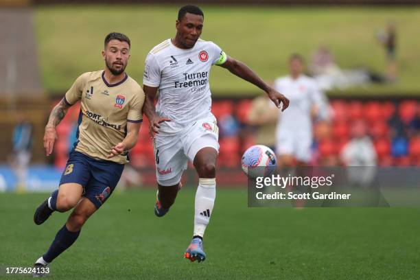 Apostolos Stamatelopoulos of the Jets competes for the ball with Marcelo of the Wanderers during the A-League Men round three match between Newcastle...