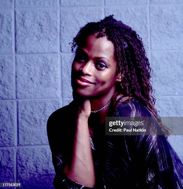 Portrait of British singer Des'Ree as she poses backstage at the First Midwest Bank ampitheater, Tinley Park, Illinois, August 17, 1998.