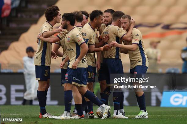 Apostolos Stamatelopoulos of the Jets celebrates his goal with team mates during the A-League Men round three match between Newcastle Jets and...