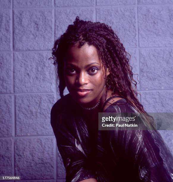 Portrait of British singer Des'Ree as she poses backstage at the First Midwest Bank ampitheater, Tinley Park, Illinois, August 17, 1998.