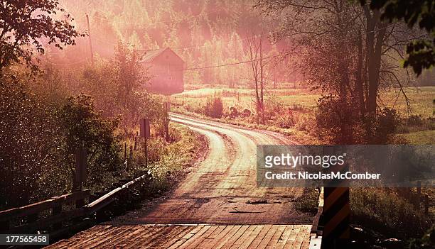 autumn panoramic landscape with winding road and fog - eastern townships stockfoto's en -beelden