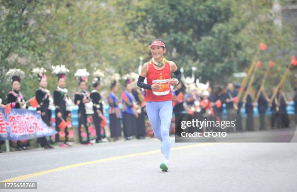 Participants run during the 2023 Guizhou Ring Leigong Mountain Marathon in Leishan county, Qiandongnan, Guizhou Province, China, Nov 11, 2023.