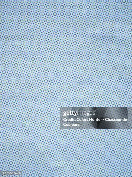 very close-up of a light blue poster printed using the offset technique in paris, france - print foto e immagini stock