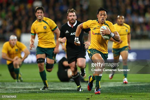 Christian Lealiifano of the Wallabies makes a break during The Rugby Championship Bledisloe Cup match between the New Zealand All Blacks and the...