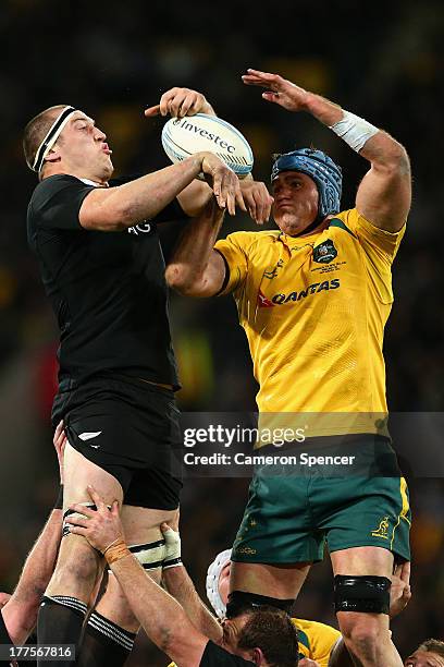 Brodie Retallick of the All Blacks contests a lineout ball with Wallabies captain James Horwill during The Rugby Championship Bledisloe Cup match...