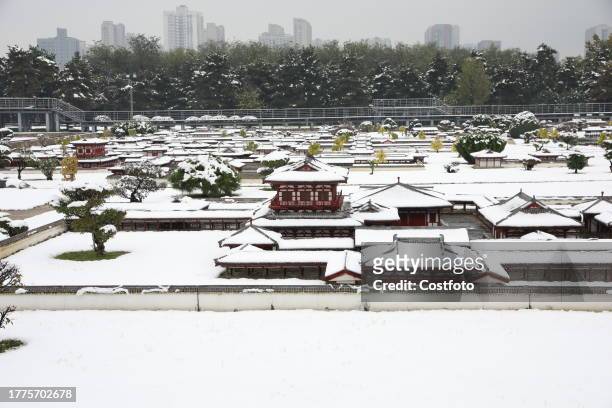 Miniature landscape palace of Xi 'an Daming Palace National Heritage Park is seen under heavy snow in Xi 'an City, Shaanxi Province, China, Nov 11,...