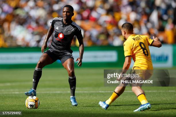 Orlando Pirates' #8 Thabang Monare is marked by Kaizer Chiefs' #8 Yusuf Maart during the Premier Soccer League South African Premier Division...