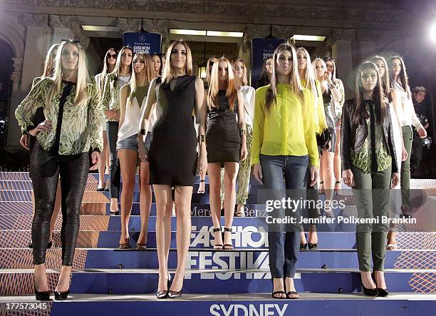 Model showcases designs by the Kardashian Kollection show during Mercedes-Benz Fashion Festival Sydney 2013 at Sydney Town Hall on August 24, 2013 in...