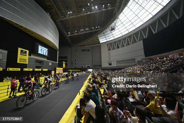 Thomas Champion of France and Team Cofidis and a general view of the peloton competing while fans cheer during the 9th Tour de France Saitama...