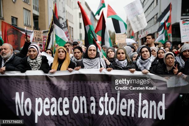 People gather for a protest organized under the motto "Decolonize Human Rights" to demand freedom for Palestine on November 11, 2023 in Berlin,...