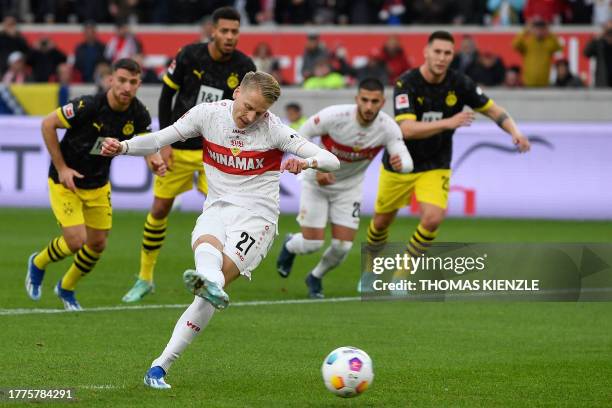 Stuttgart's German midfielder Chris Fuehrich fails to score from the penalty spot during the German first division Bundesliga football match VfB...