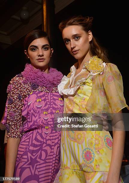 Models prepare backstage ahead of the MBFWA Trends show during Mercedes-Benz Fashion Festival Sydney 2013 at Sydney Town Hall on August 24, 2013 in...
