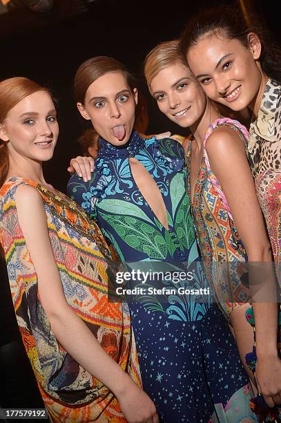 Models prepare backstage ahead of the MBFWA Trends show during Mercedes-Benz Fashion Festival Sydney 2013 at Sydney Town Hall on August 24, 2013 in...