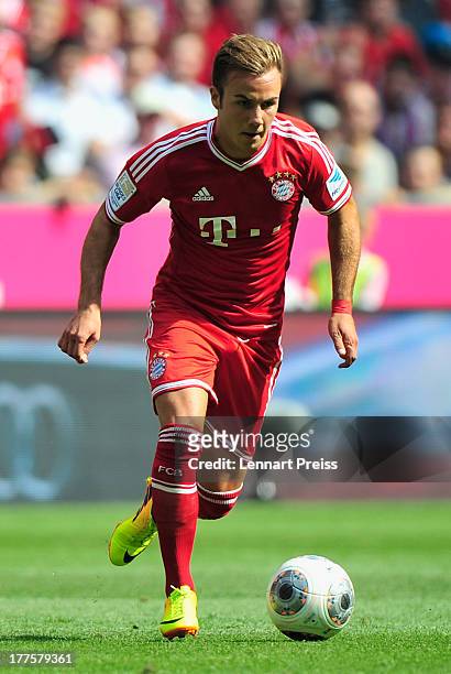 Mario Goetze of Muenchen in action during the Bundesliga match between FC Bayern Muenchen and 1. FC Nuernberg at Allianz Arena on August 24, 2013 in...