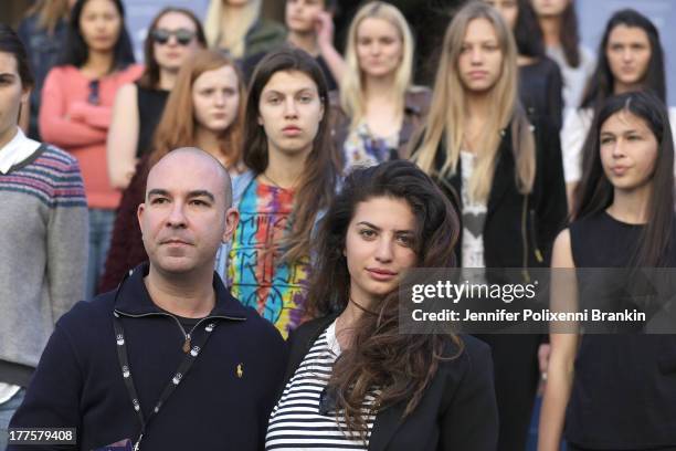 Designer Bruno Schiavi prepares with models during run-through ahead of the Kardashian Kollection show during Mercedes-Benz Fashion Festival Sydney...