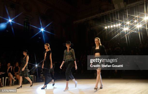 Models showcase designs by Zambesi on the runway at the MBFWA Trends show during Mercedes-Benz Fashion Festival Sydney 2013 at Sydney Town Hall on...