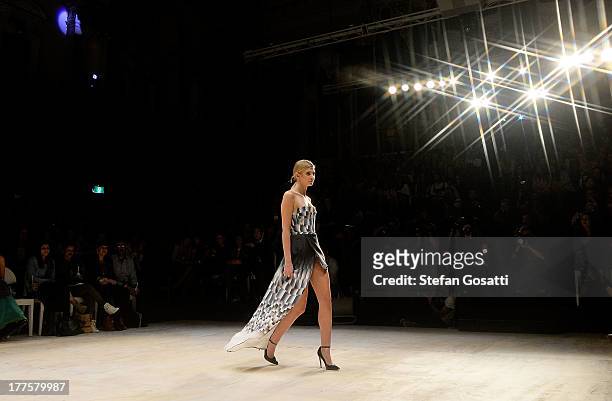 Model showcases designs by Suboo on the runway at the MBFWA Trends show during Mercedes-Benz Fashion Festival Sydney 2013 at Sydney Town Hall on...