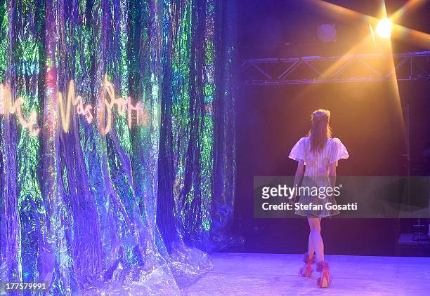 Model showcases designs by Romance Was Born on the runway at the MBFWA Trends show during Mercedes-Benz Fashion Festival Sydney 2013 at Sydney Town...