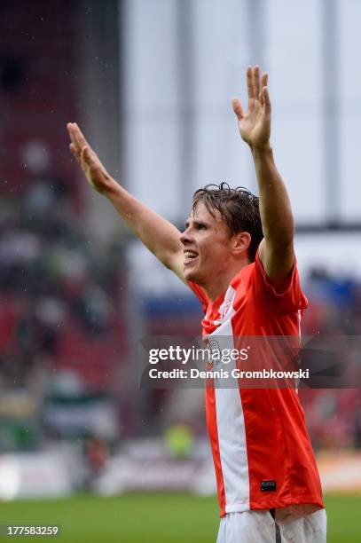 Nicolai Mueller of 1. FSV Mainz 05 celebrates after scoring his team's second goal during the Bundesliga match between 1. FSV Mainz 05 and VfL...