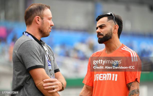 De Villiers and Virat Kohli of India interact ahead of the ICC Men's Cricket World Cup India 2023 between India and South Africa at Eden Gardens on...