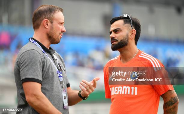 De Villiers and Virat Kohli of India interact ahead of the ICC Men's Cricket World Cup India 2023 between India and South Africa at Eden Gardens on...