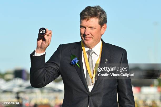 Former Essendon chairman David Evans is seen drawing barrier twenty three for Cleveland at the barrier draw of The Melbourne Cup during Derby Day at...